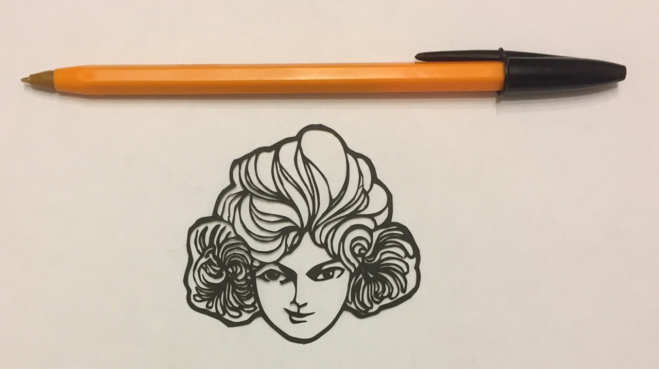 papercut 018 with pen for scale