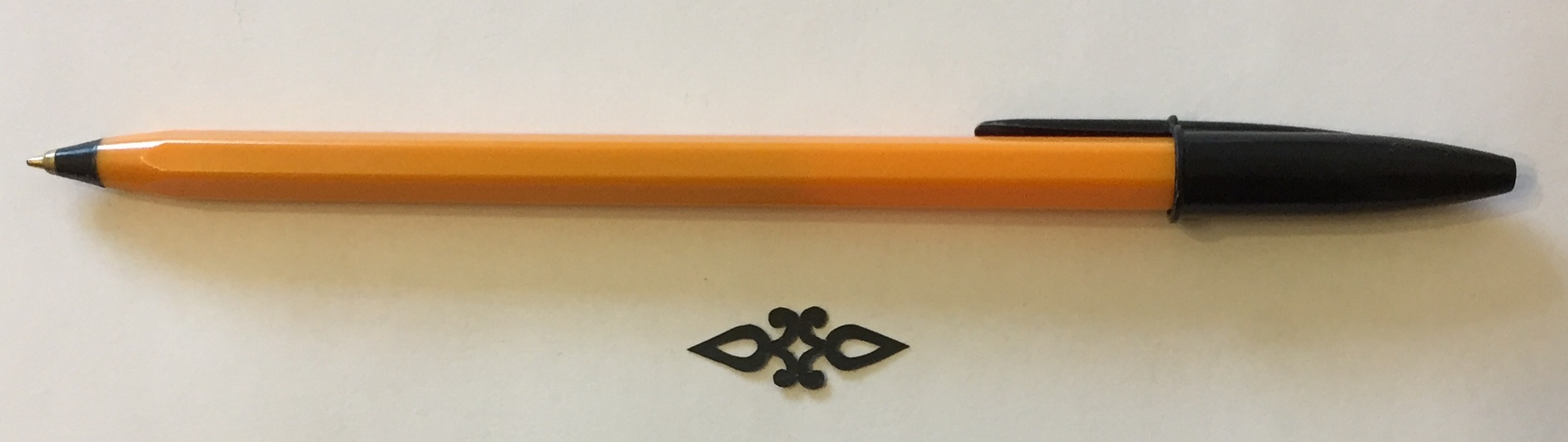 papercut 039 with pen for scale