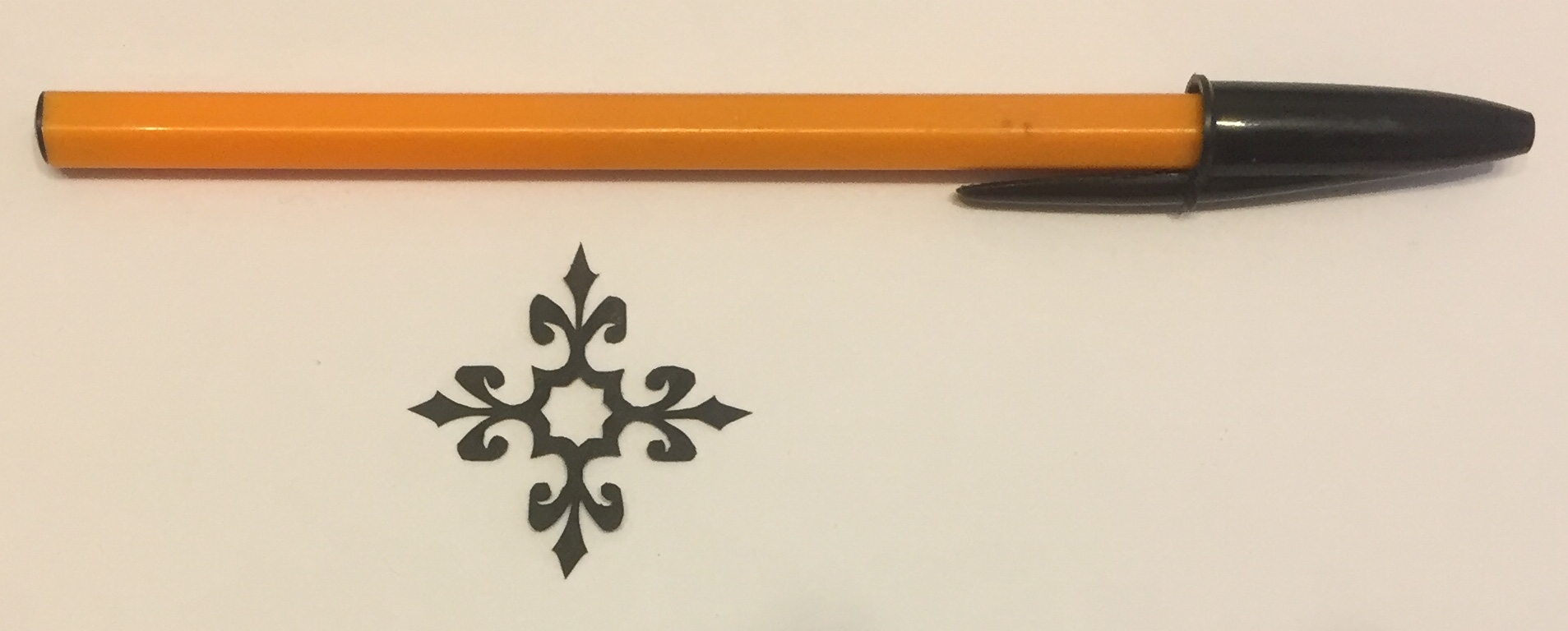 papercut 040 with pen for scale