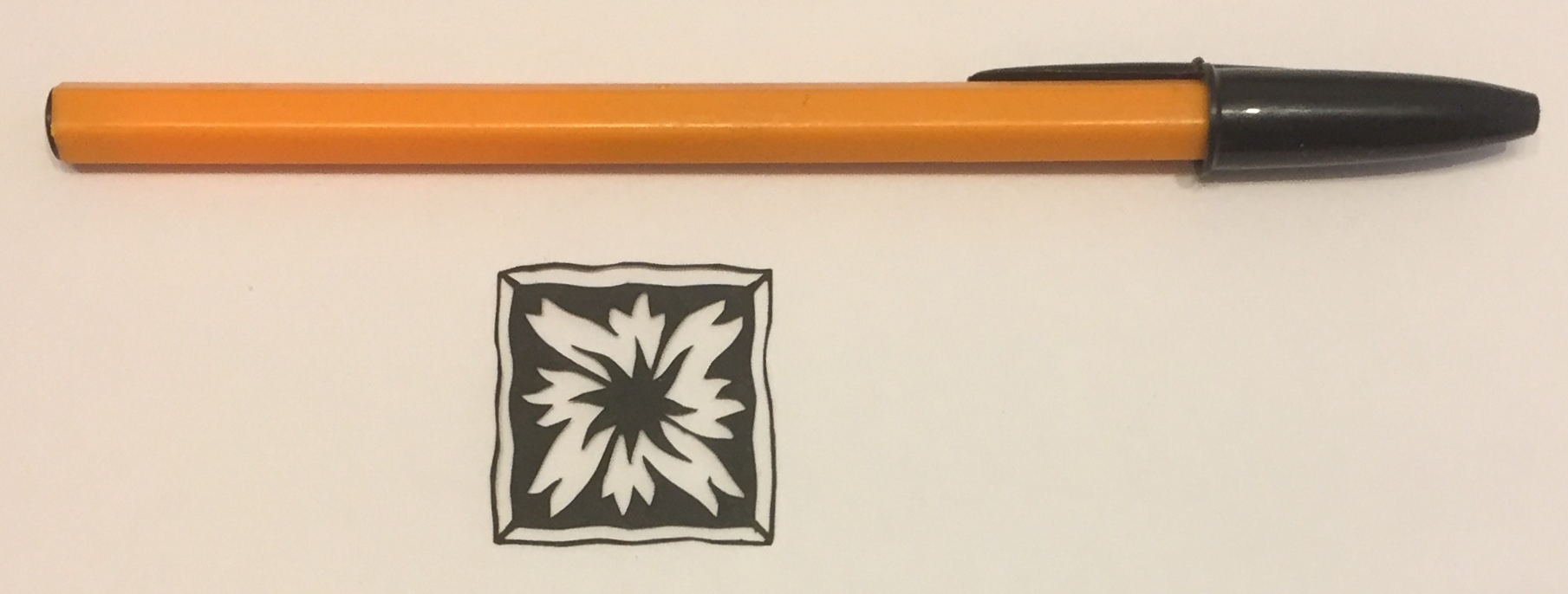 papercut 041 with pen for scale