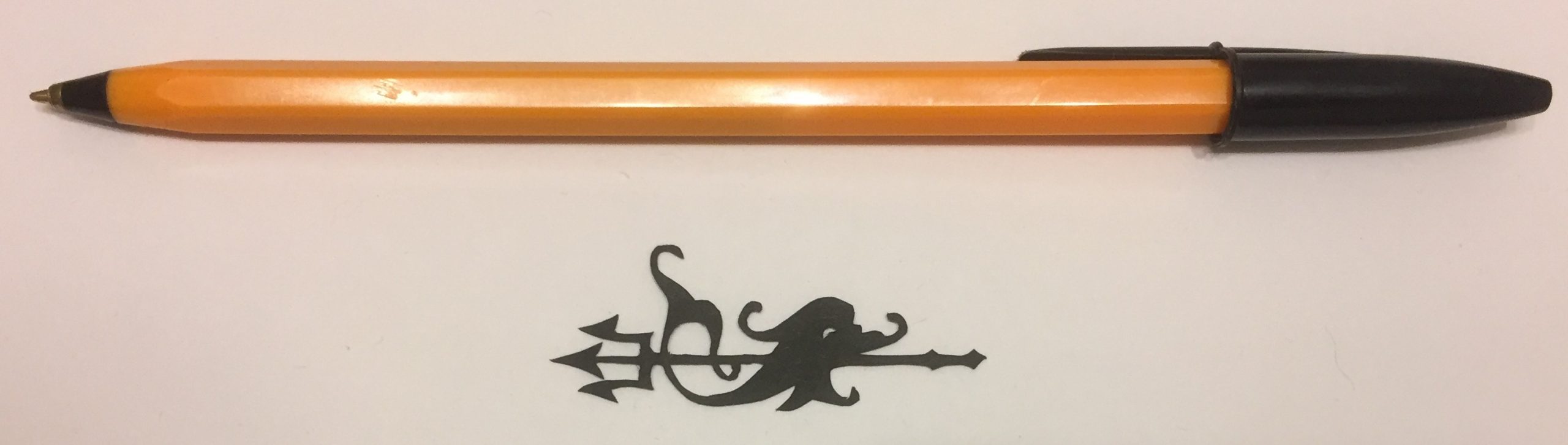 fish and trident papercut 043 with pen for scale - Kay Vincent LaserSister.JPG