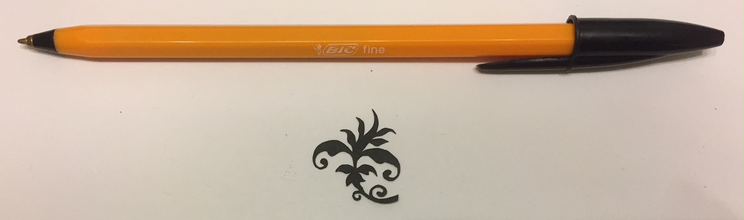 papercut 044 with pen for scale