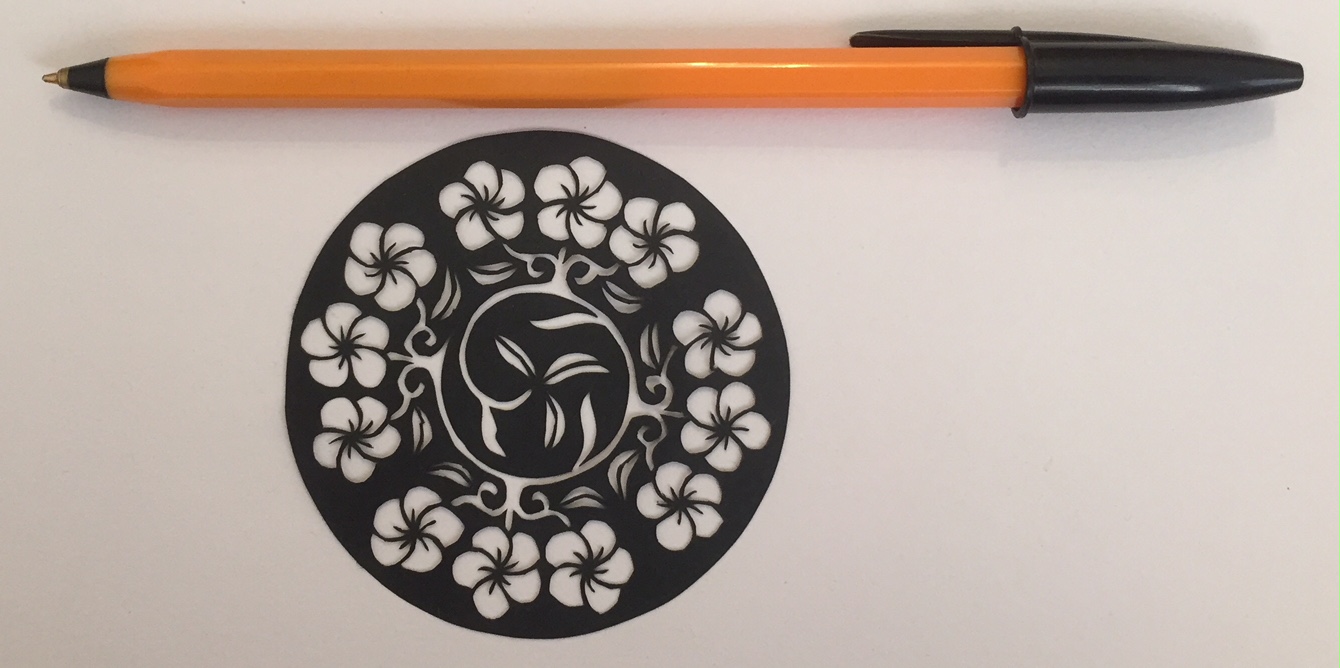 papercut 045 with pen for scale