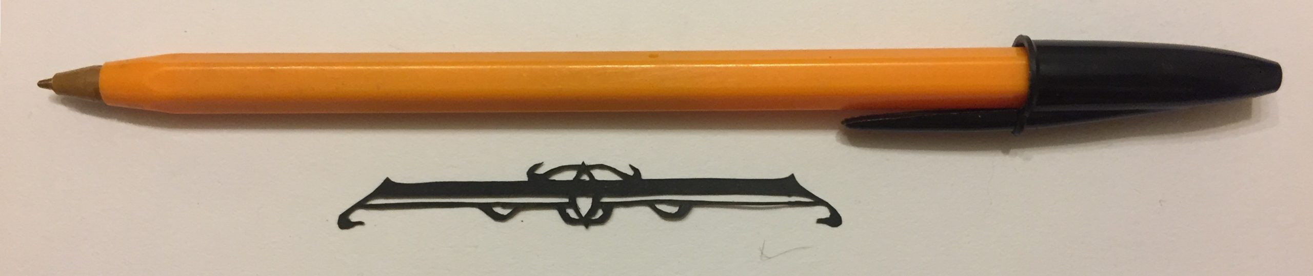 papercut 047 with pen for scale