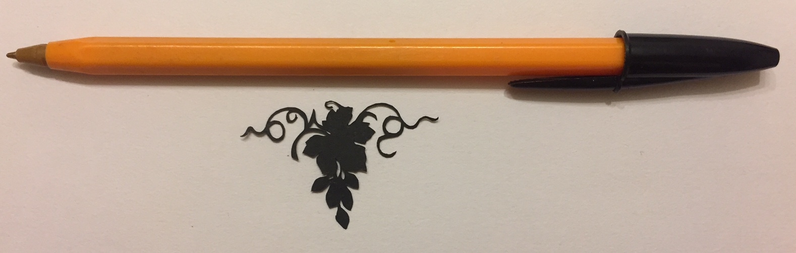 papercut 051 with pen for scale