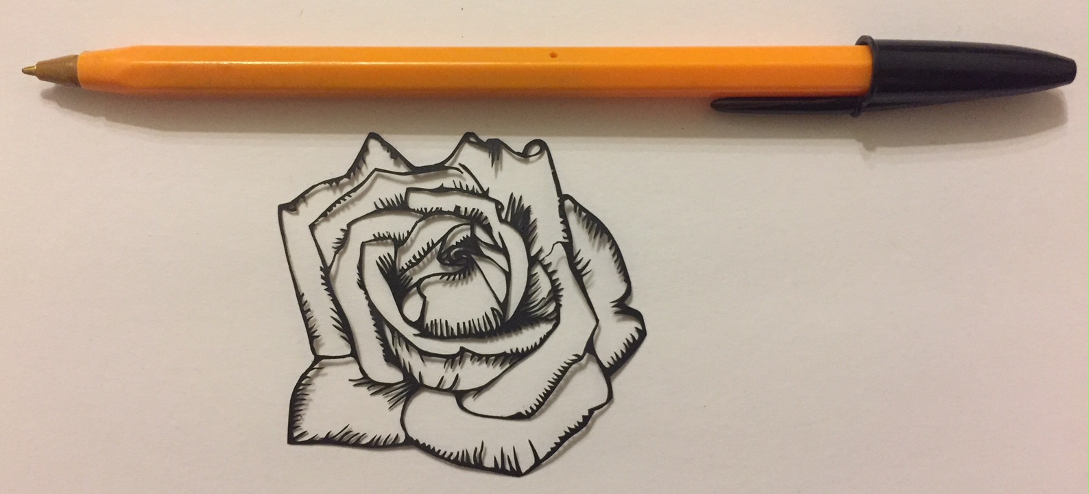 rose papercut 058 with pen for scale - Kay Vincent - LaserSister