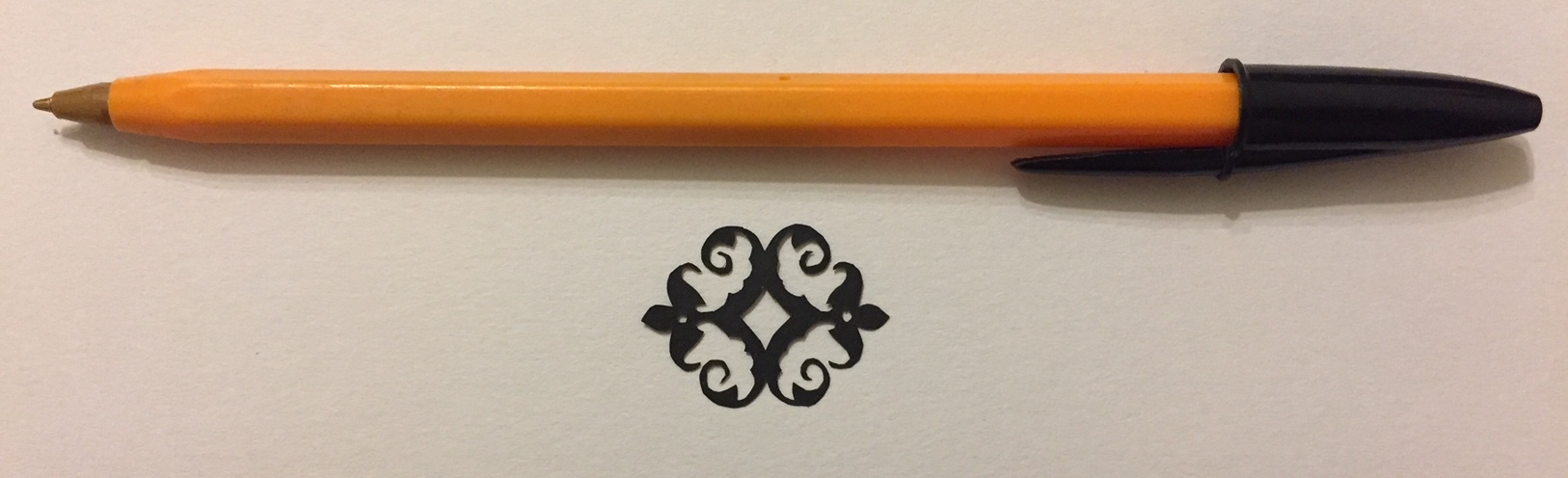 papercut 064 with pen for scale - Kay Vincent - LaserSister