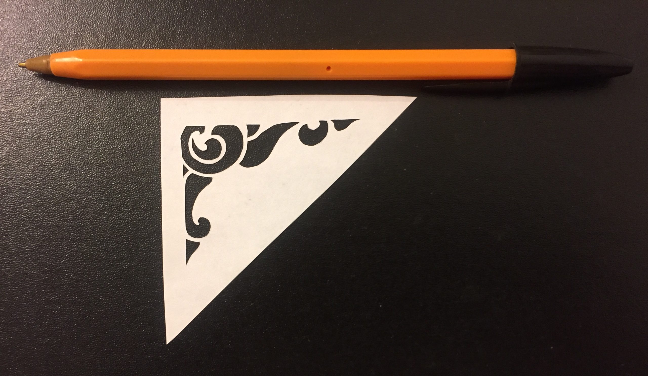 papercut 083 with pen for scale - Kay Vincent - LaserSister.JPG