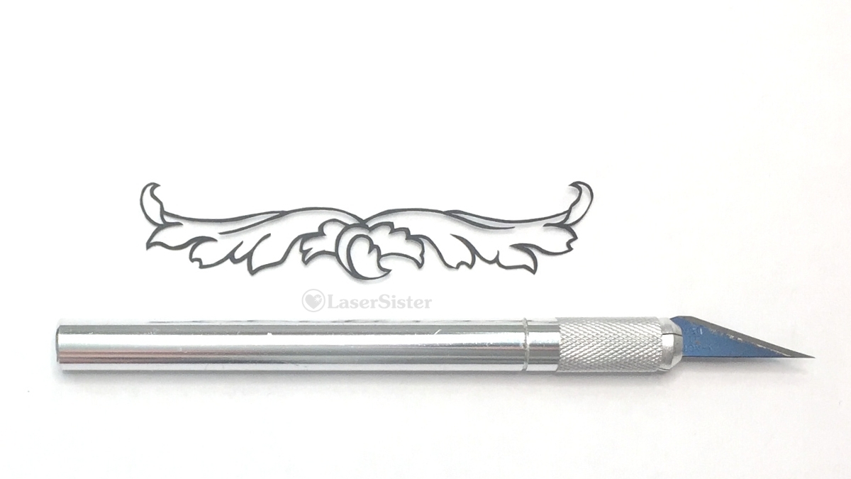 leaf wings papercut - horizontal with scalpel for scale - Kay Vincent - LaserSister