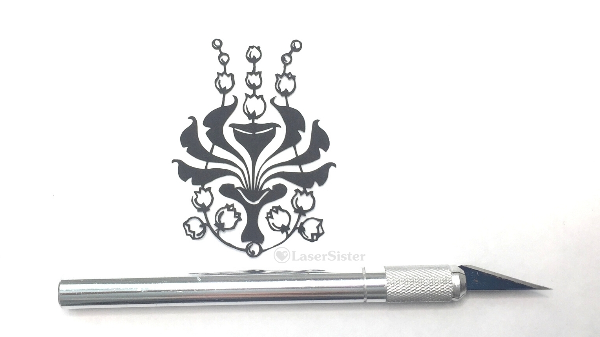 lily of the valley2 papercut - horizontal scalpel for scale - Kay Vincent - LaserSister