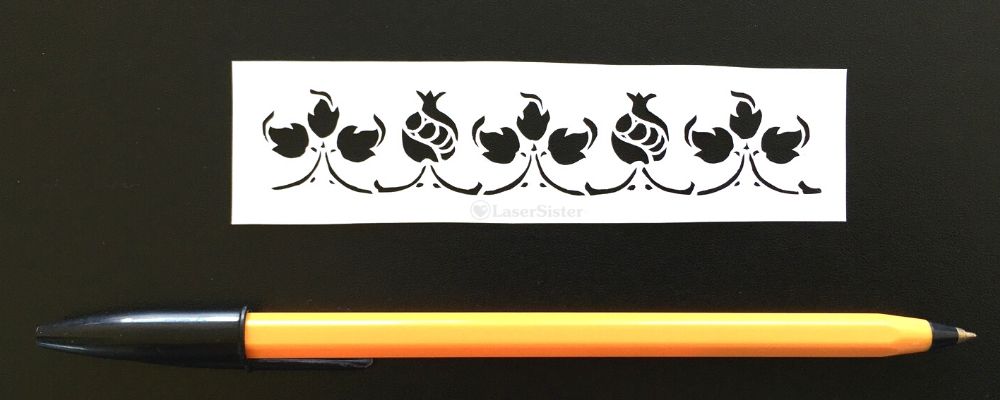 papercut k708 - pomegranates and leaves with pen for scale - LaserSister - KayVincent wm